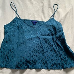 Teal cropped tank with design